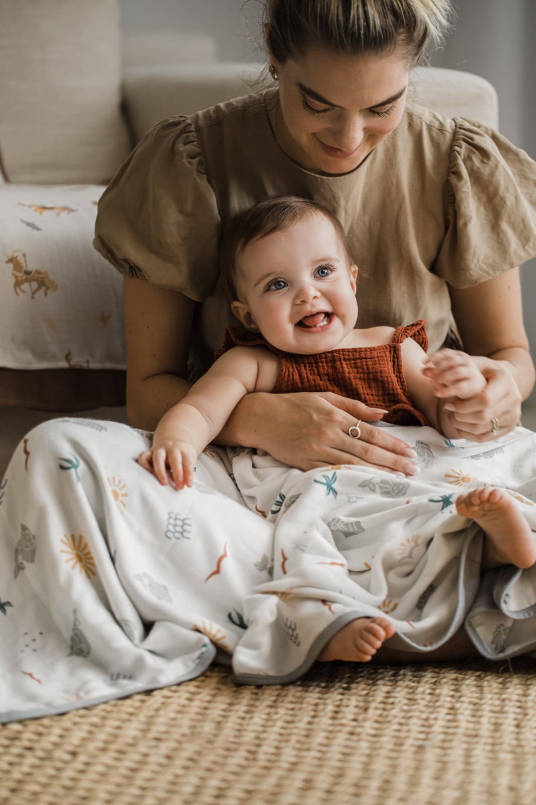 Baby wrapped in a Little Rei bamboo swaddle
