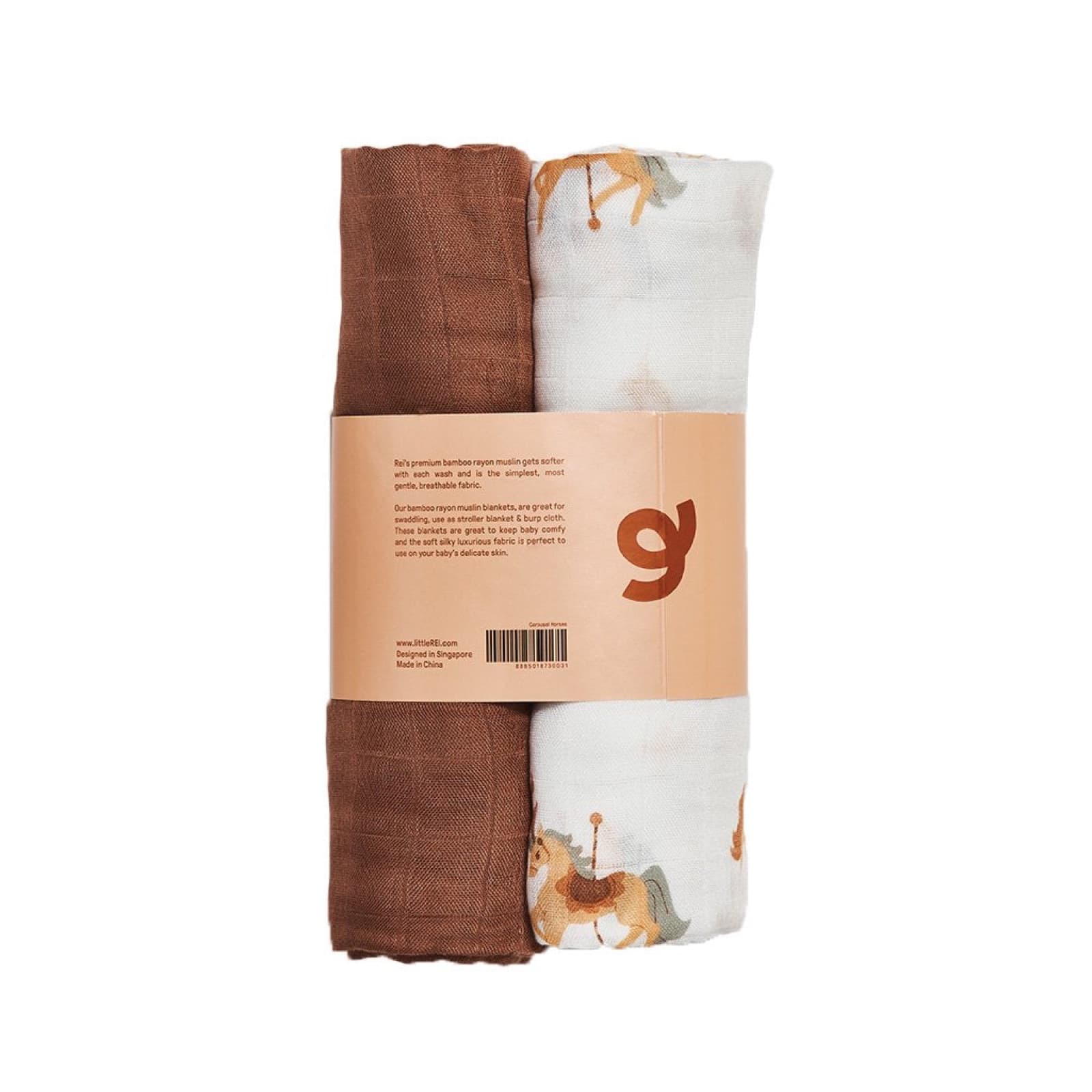 A two-pack of bamboo muslin swaddles rolled together, one rust brown and one printed with carousel horses