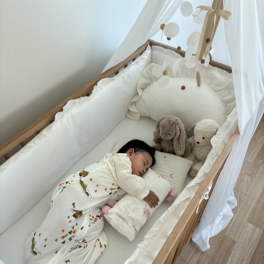 Nap time in a Little Rei sleep sack