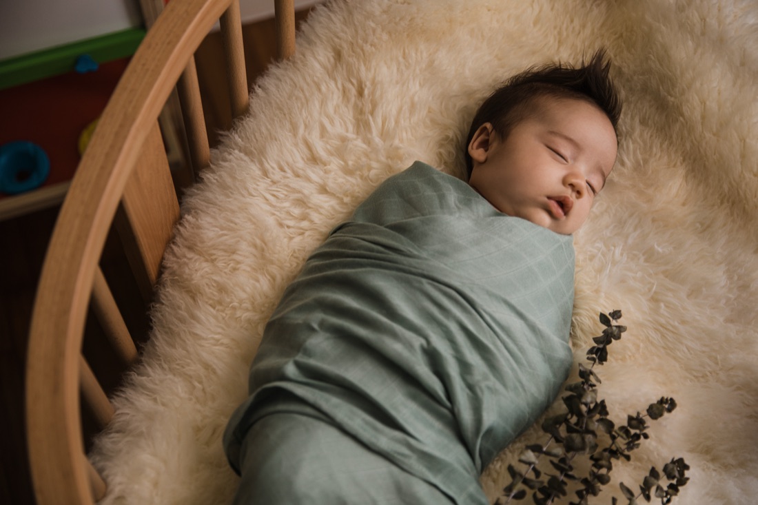 Little Rei swaddle lifestyle moment