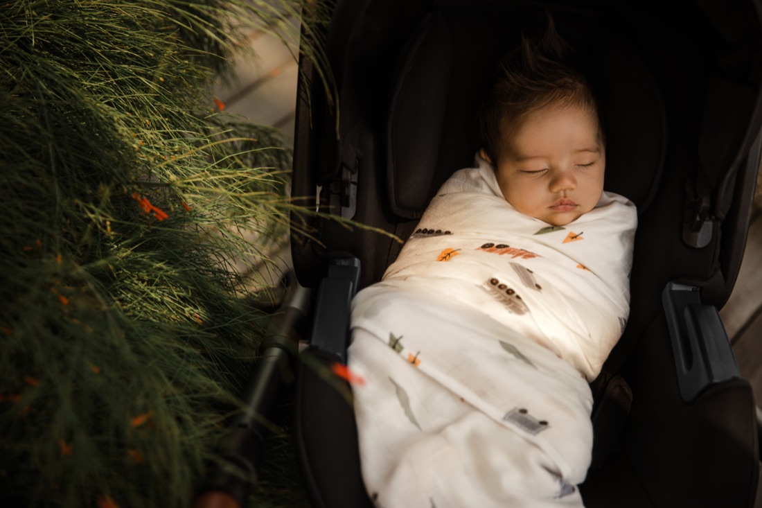 Baby on a Little Rei bamboo swaddle